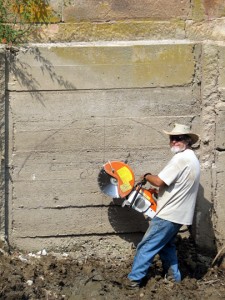 Cutting Concrete Out of Old Gate